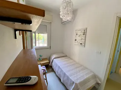Letto o letti in una camera di VIVIHOLIDAY