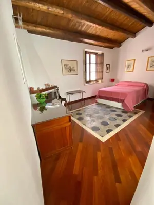 Letto o letti in una camera di Residenza Eos