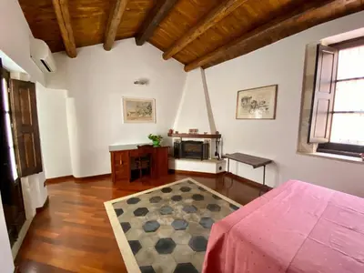 Letto o letti in una camera di Residenza Eos