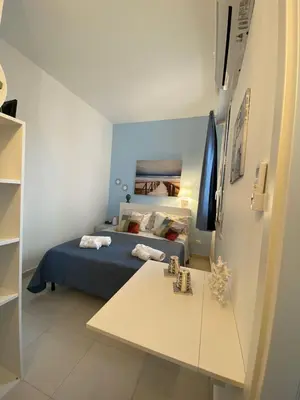 Letto o letti in una camera di Venti di Brucoli
