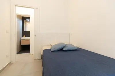 Letto o letti in una camera di Venti di Brucoli