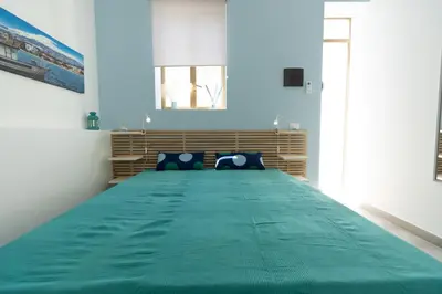 Letto o letti in una camera di Venti di Brucoli