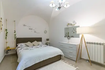 Letto o letti in una camera di Cocciu d’Amuri Home