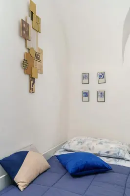 Letto o letti in una camera di Cocciu d’Amuri Home