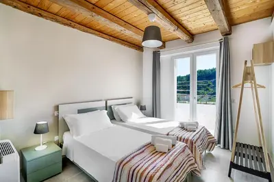 Letto o letti in una camera di Villa Belvedere