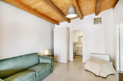 Letto o letti in una camera di Villa Belvedere