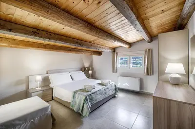 Letto o letti in una camera di Villa Belvedere