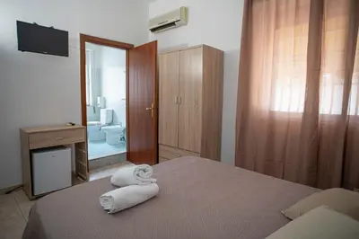 Letto o letti in una camera di Poesia del Mare B&B