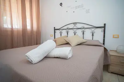 Letto o letti in una camera di Poesia del Mare B&B