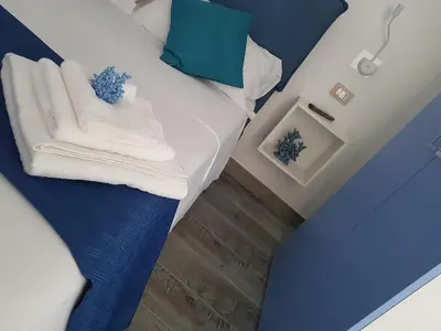 Letto o letti in una camera di Amareilmare1