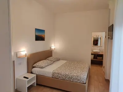 Letto o letti in una camera di Le Tre Casuzze