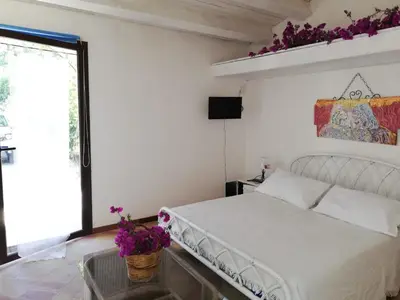 Letto o letti in una camera di Mater Christi