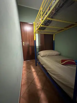 Letto o letti in una camera di Antonio's villa al mare con vista sull'Etna Vaccarizzo Catania