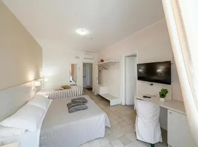 Letto o letti in una camera di Ortigia Mastrarua rooms