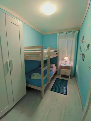 Letto o letti in una camera di Il Bounty - struttura per soggiorni brevi -