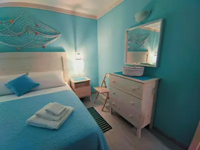 Letto o letti in una camera di Il Bounty - struttura per soggiorni brevi -