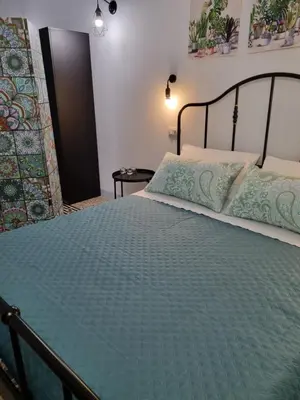 Letto o letti in una camera di CASA Zia Sarina