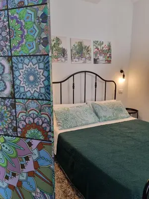 Letto o letti in una camera di CASA Zia Sarina