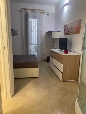 TV o dispositivi per l'intrattenimento presso casa vacanze Maniace 80
