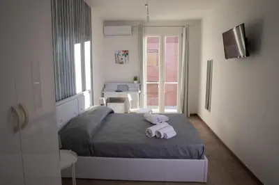 Letto o letti in una camera di Largo Sicilia B&B