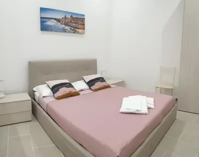 Letto o letti in una camera di Apartment Bedda Mia