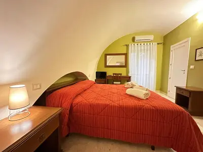 Letto o letti in una camera di Historic B&B Apartments Home