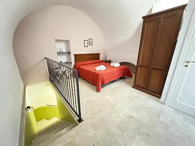 Letto o letti in una camera di Historic B&B Apartments Home