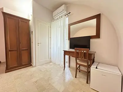 TV o dispositivi per l'intrattenimento presso Historic B&B Apartments Home