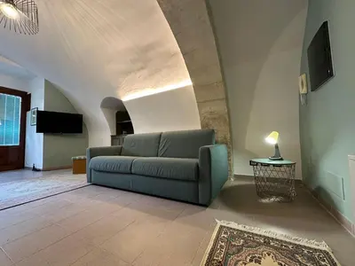TV o dispositivi per l'intrattenimento presso Historic B&B Apartments Home