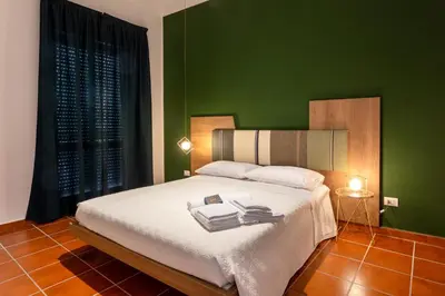 Letto o letti in una camera di Apollo Apartment Ortigia