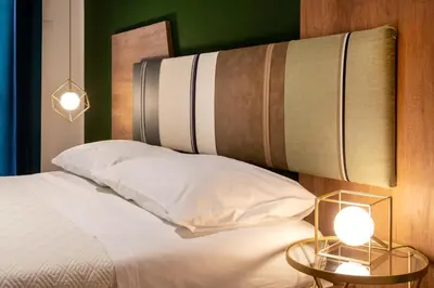 Letto o letti in una camera di Apollo Apartment Ortigia