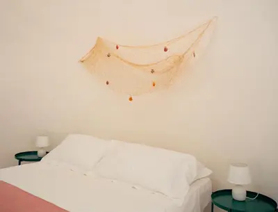 Letto o letti in una camera di Tambu a mare
