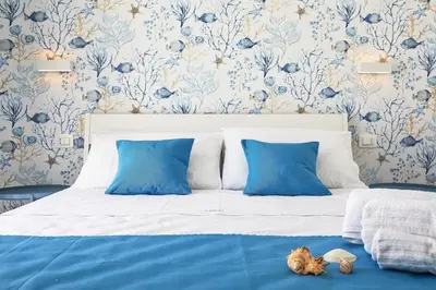 Letto o letti in una camera di I Gufi Bed & Breakfast Marzamemi