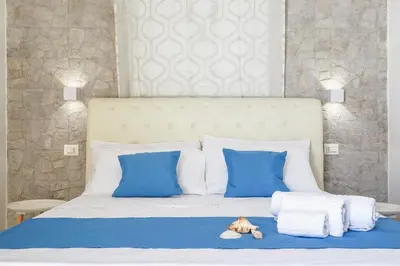 Letto o letti in una camera di I Gufi Bed & Breakfast Marzamemi