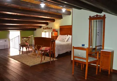 Letto o letti in una camera di SUD room Palazzo Rau della Ferla