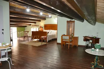 Letto o letti in una camera di SUD room Palazzo Rau della Ferla