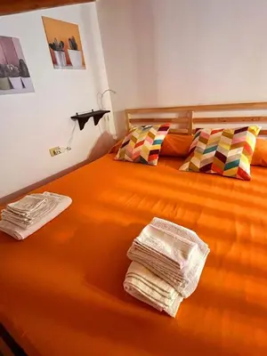 Letto o letti in una camera di Casa di Ortigia