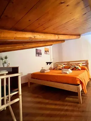 Letto o letti in una camera di Casa di Ortigia