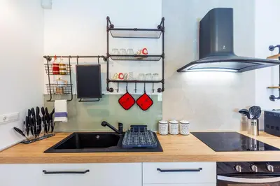 Cucina o angolo cottura di GuestHost - Vakalu Piazza Duomo Charming Apartment