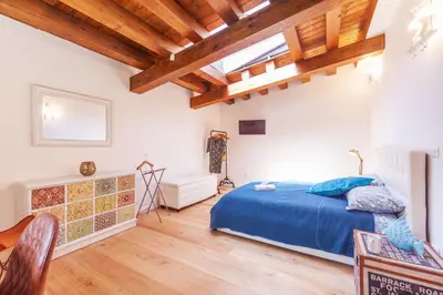 Letto o letti in una camera di GuestHost - Vakalu Piazza Duomo Charming Apartment