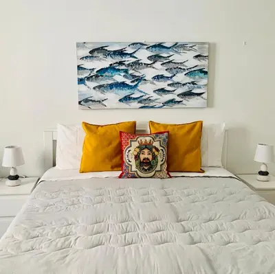 Letto o letti in una camera di Casa mia bella