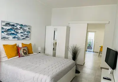 Letto o letti in una camera di Casa mia bella