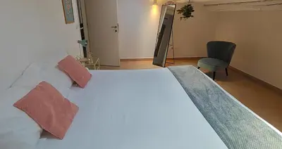 Letto o letti in una camera di Mansarde Crispi
