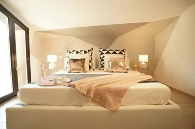 Letto o letti in una camera di Appartamento Sweet Rose