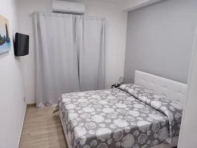 Letto o letti in una camera di Duomo Home