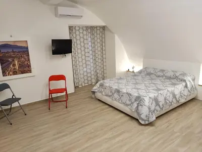 Letto o letti in una camera di Duomo Home