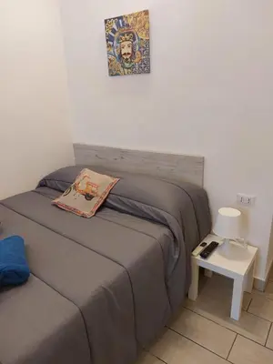 Letto o letti in una camera di Al centro di tutto