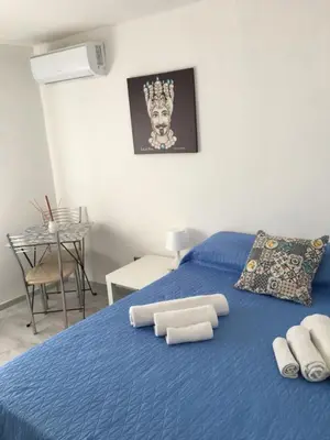 Letto o letti in una camera di Al centro di tutto