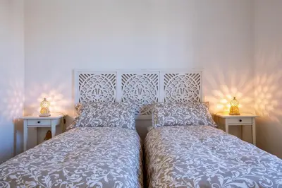 Letto o letti in una camera di Sunrise over the sea