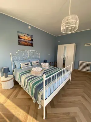 Letto o letti in una camera di Villa per vacanze Isola